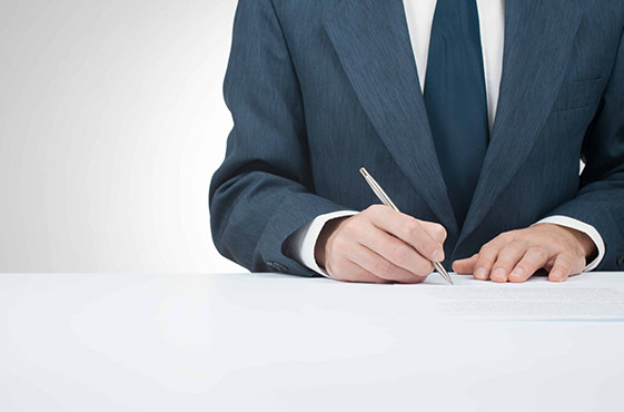 Underwriter reviewing a document